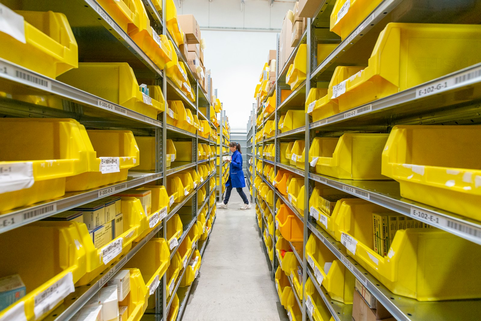 Operations team reviewing cargo in a warehouse